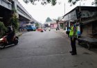 Unit Lantas Polsek Cikampek Gatur Pagi di Bawah Fly Over Cikampek Cegah Kemacetan 