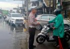 Unit Lantas Polsek Klari Lakukan Gatur Lalin, Antisipasi Kemacetan Pasca Genangan Air