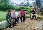Giat Sinergitas TNI - Polri, Bhabinkamtibmas bersama Babinsa TNI Laksanakan Patroli Wilayah Bersama