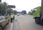 Longweekend Imlek Polsek Cikampek Pantau Pintu Tol Kalihurip Cikampek, Pastikan Jalur Aman dan Lancar 